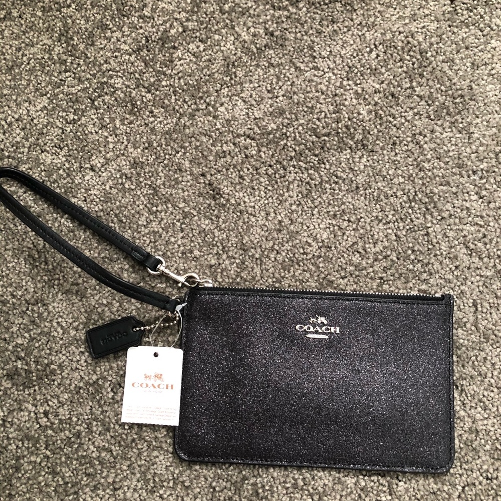 Sparkly black Coach wristlet